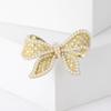 Broche de perlas con lazo dulce y lindo de estilo coreano, ramillete de perlas con incrustaciones de aleación, temperamento de alto grado, accesorios de ropa sencillos