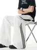 Pantalones casuales a rayas de bloques de color estilo deportivo para hombre, delgados de verano, holgados, de pierna recta, pierna ancha, en blanco