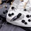 Arte de uñas Pequeñas joyas Camellia Tridimensional Resina negra Accesorios para uñas Entrada Lujo Internet Celebridad Diamante Joyería