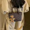 Estampa diagonal de bolinhas, bolsa de ombro fashion, design de coração moderno, estilo de nicho, novo design de bolsa 2026, bolsa transversal feminina