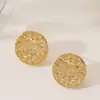 Pendientes redondos texturizados geométricos simples y exquisitos de moda transfronteriza europea y americana con un diseño versátil de lujo ligero de alta gama