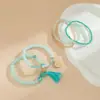 Pulseira de Contas de Vidro Azul Europeia e Americana Transfronteiriça Mais Vendida Pulseira Elástica Elegante Feminina com Borla Azul