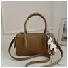 Bolso de mano moderno y versátil tipo almohada para mujer, nuevo modelo primavera 2026, bolso cruzado de un solo hombro elegante de alta calidad