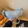Bolsa Croissant Nicho Coreia do Sul Transfronteiriça Feminina 2024 Nova Versátil Casual Super Popular Bolsa Bolinho Moda Bolsa de Ombro Transversal