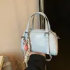 Bolso de Mano Versátil de Moda 2025 Verano Nuevo Versión Coreana Bolso Cruzado Simple para el Trabajo Bolso de Hombro de Gama Alta de Nicho