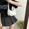 Bolsa nas axilas Bolsa de bagel de verão 2024 feminina transfronteiriça Nova moda moderna Bolsa crescente Nicho de alta qualidade Bolsa de ombro para todos os jogos