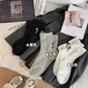 Calcetines con lazo para mujer estilo ballet miu calcetines de tubo simples blanco y negro ins Chaodong gate calcetines simples coreanos para mujer