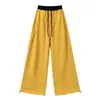 Calça de moletom feminina com design de cordão americano e rebites de outono, cintura elástica, retalhos, calça casual de perna larga color-block, calça atlética de perna curva