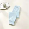 Calças de outono de algodão puro para crianças, calças térmicas de algodão de cor sólida para meninos e meninas, leggings listrados de algodão A-class para crianças de tamanho médio e grande, calças de dormir para casa