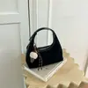 Bolso de mano informal transfronterizo, bolso de hombro, bolso cruzado, nuevo estilo vintage otoño 2026, gran capacidad, elegante, para el trabajo, tipo bolsa de albóndiga