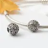 Huiyue nuevo retro DIY metal plata antigua con cuentas flor de seis pétalos pulsera redonda accesorios fábrica de cuentas al por mayor