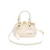 Bolso pequeño nuevo tipo concha con estampado vintage, letras repujadas de moda, bolso de verano para mujer con textura de alta calidad, elegante bolso cruzado para el hombro