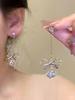 Clip para oreja de borla Super Hada Estrella para Mujer Aretes largos elegantes de lujo ligero ins nuevos nicho de celebridad de internet nuevos aretes combinan con todo