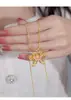 Collar con forma de mariposa y flor de vena de esmalte filigrana de método antiguo para mujer, temperamento retro, cadena de clavícula dorada de alta gama, regalo