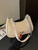 Bolso minimalista de textura tejida para debajo del brazo, nuevo bolso de hombro de moda verano 2026, elegante bolso cruzado para el trabajo y los desplazamientos