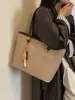 Bolso de mano retro transfronterizo estilo coreano para mujer, gran capacidad, nueva colección de verano 2026, bandolera versátil y simple, bolso de mano para el trabajo