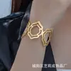 Pulseira oca geométrica nova tendência da moda transfronteiriça venda quente nicho feminino personalidade criativa abertura joia de mão atacado