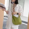 Nuevo modelo de verano bolso hobo de piel de vaca de capa superior en forma de media luna, estilo minimalista, versátil para ir al trabajo, de un solo hombro, bajo el brazo, bolso tipo bollo cruzado para mujer