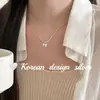 Cadena para clavícula estilo minimalista ins japonés y coreano, S925 plata de ley, collar de tubo de plata con lazo, dulce y versátil con sentido de atmósfera