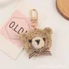 Llavero Colgante Oso de Peluche Lindo Pajarita para Coche Estilo Fresco Accesorios de Oso de Tela Funda para Auriculares Decoración de Bolso Femenino