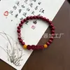 Pulseira de contas redondas de areia dourada roxa de minério bruto de cinábrio com design de nuvem auspiciosa e cadeado da fortuna, pulseira de areia dourada roxa de laço único, atacado de pequenos presentes