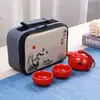 Juego de Té Kung Fu de Viaje Juego Una Tetera Dos Tazas Tetera Rápida para Invitados Juego Portátil para Exteriores Hogareño Cerámica logo
