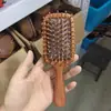 Venta al por mayor desde la fábrica de origen: Peine de masaje de sándalo con pequeñas imperfecciones, peine con cojín de aire, peine de masaje de meridianos del cuero cabelludo, unisex