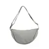 Bolsa de mano de color liso estilo japonés para mujer, nuevo modelo 2025, bolso cruzado ligero, bolso de hombro, bolsa de lona, bolso de axila, transfronterizo