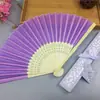 Comercio electrónico transfronterizo abanico femenino elegante más vendido 21cm abanico de boda abanico femenino caja hueca 14 colores opcionales