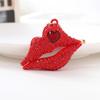 Llavero de coche con pintura de labios nueva de estilo europeo y americano, colgante de metal con bolsa de diamantes de Yiwu