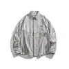 Yidao Vintage 2026 Otoño Nuevo Estilo Japonés Sencillo Retro Diseño de Bolsillo con Parche Corte Holgado Camisa de Manga Larga Rayada