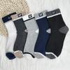 Meias Zhuji Masculinas Cano Médio Outono e Inverno Cor Blocada Quente Absorventes de Suor Simples Desodorantes Esportivas Masculinas Longas Preto e Branco Tendência