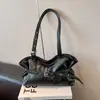 Nova bolsa de ombro feminina estilo coreano Shuai Mi Jia, bolsa de axila de nicho da moda com grande capacidade, bolsa tote texturizada para o dia a dia