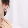 Pendientes retorcidos para mujer de plata de ley 925 estilo ins europeo y americano pendientes retorcidos de moda joyería para orejas de lujo ligero temperamento de alta calidad