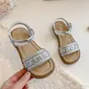Sandalias para Niñas Zapatos Infantiles 2026 Nuevas Sandalias de Playa de Verano Sandalias de Princesa para Niña Pequeña Sandalias Romanas Estilo Británico