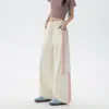 Calça de trabalho larga listrada color block esportiva de secagem rápida nova para primavera e outono para homens e mulheres, apresentando um design curvo estiloso e calças compridas casuais
