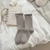 Calcetines de caña media para mujer con lazo y borde enrollado, para otoño e invierno, resistentes, estilo universitario Melard, de algodón, sin costuras y con diseño de volantes