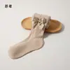 Colección de primavera y otoño transfronteriza: Leggings infantiles con diseño estilo princesa, versátiles para usar como prenda exterior, con rayas verticales y un gran moño, adecuados para niñas