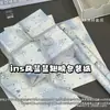 Papel de presente azul claro com asas fofas para presentes, papel de presente com tema de céu estrelado dos sonhos, papel de embalagem de alto valor estético