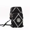 Bolsa diagonal para teléfono móvil al por mayor Nueva Bolsa pequeña para mujer Bolsa de tela para teléfono móvil bolsa vertical para cuello brazo muñeca monedero