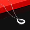 Venta al por mayor de fabricante Venta caliente transfronteriza europea y americana Nuevo collar de cerámica y acero de titanio con corte hueco de gota de agua simple de 20 mm para mujer