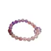 Pulsera elástica de cristal natural material de pozo antiguo temperamento coreano pulsera de cristal de fresa nueve fuegos púrpuras joyería al por mayor