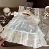 Ropa Infantil Estilo Coreano 2026 Nuevo Conjunto de Dos Piezas Verano Niñas: Chaleco de Mangas Volantes con Estampado Floral y Pantalones Falda con Tirantes y Ribete de Encaje Blanco