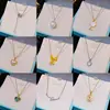 Novo Sino de Vento de Meio Verão Flor de Lírio Pingente Coração Colar Personalidade Retrô Concha Real Trevo de Quatro Folhas Celebridade da Internet Exquisita Corrente para Clavícula