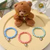 Muñeca Linda Perro de Mano Corazón de Melocotón Collar Accesorios DIY Collar de Amor Oso de Peluche Muñeca Decoración Venta al por Mayor