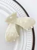 Duowei joyería ácido acético FRANCIA Etiqueta Dorada sentido de alta gama gato Mini pinza pequeña de agarre pinza lateral flequillo pinza pequeña