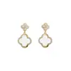 Elegante conjunto floral de cuatro piezas con incrustaciones de diamantes: collar, pulsera, aretes, anillo para mujer, bañado en oro de 18k, joyería popular europea y americana