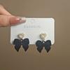 Pendientes de lazo de terciopelo rojo festivos de otoño e invierno de Corea del Sur, pendientes elegantes de amor dulce para mujer.