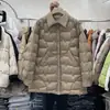 Chaqueta de plumón ligera para mujer de longitud media 2023 Nueva moda para mujer Cuello de camisa laminado Plumón de pato blanco Chaqueta de invierno