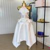Roupas Femininas Transfronteiriças Europeias e Americanas Verão 2025 Novo Sexy Elegante Decoração de Borboleta Cintura Alta Decote Halter Vestido Assimétrico